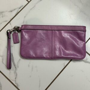 Coach clutch with wrist strap.  Lilac leather